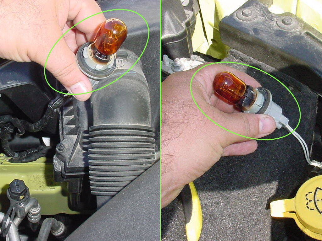 Repeat socket and bulb removal for the other side. Remove approximately 3 inches (75mm) of electrical tape and wire loom from underneath both lamp sockets.